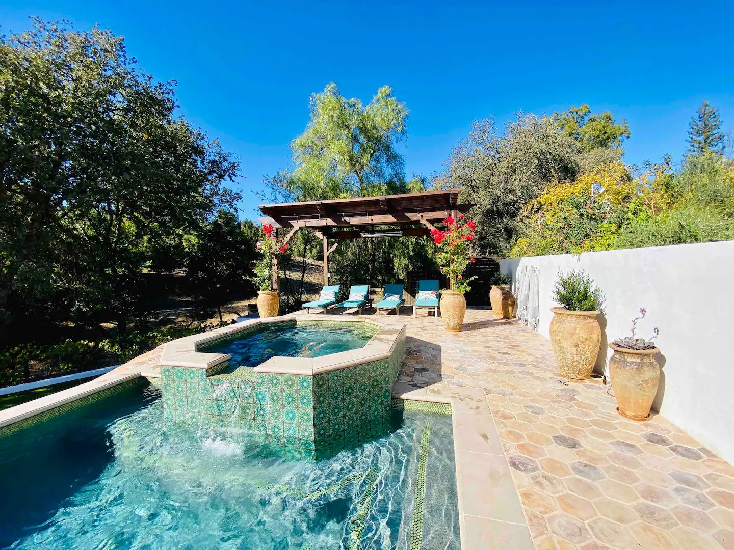 Every detail matters — from hand-laid tile to custom stucco and beam work. The ADU and pool coming to life.