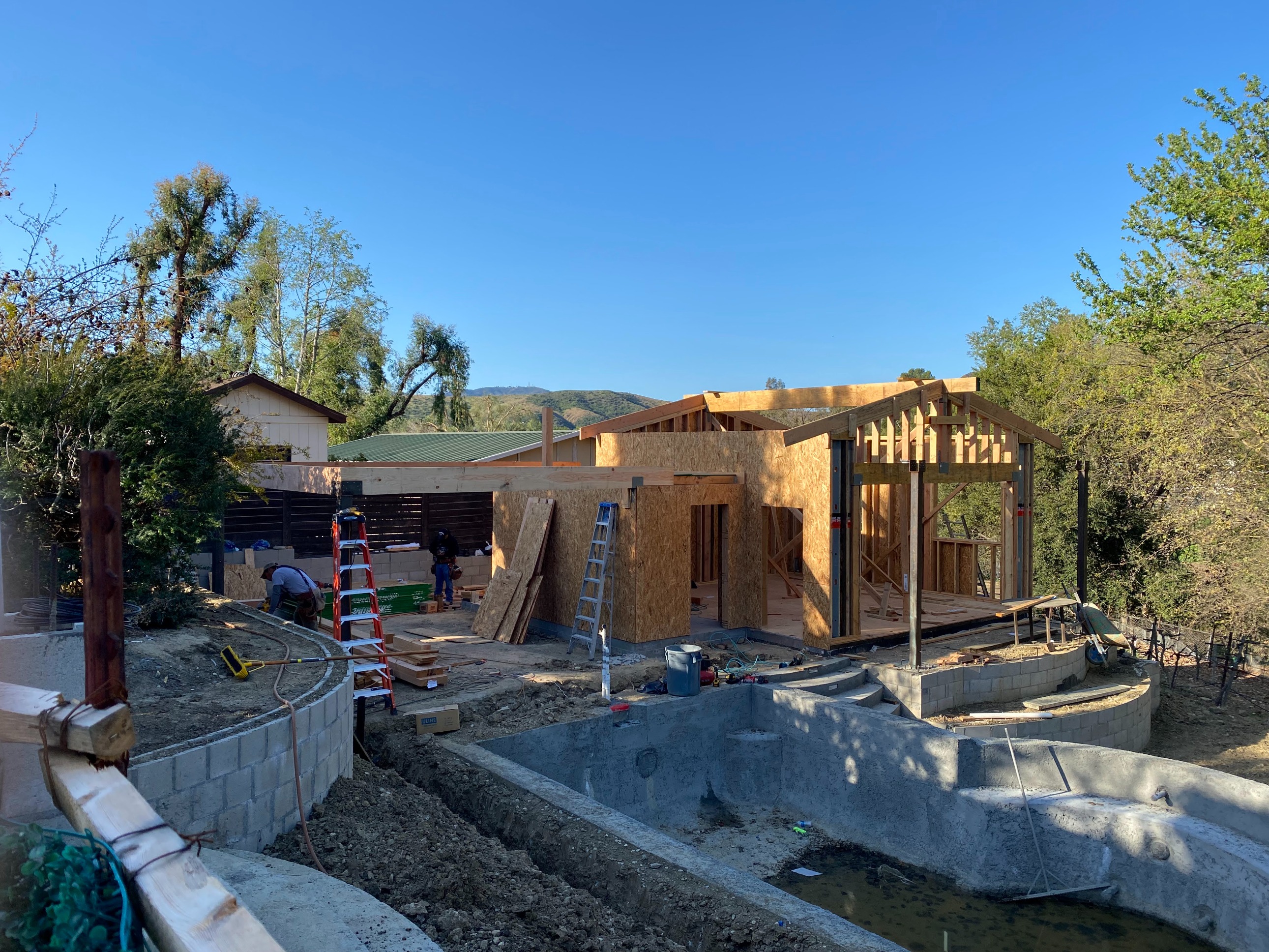 Building beauty from the ground up — framing the ADU and setting structural elevation for the multi-level pool.