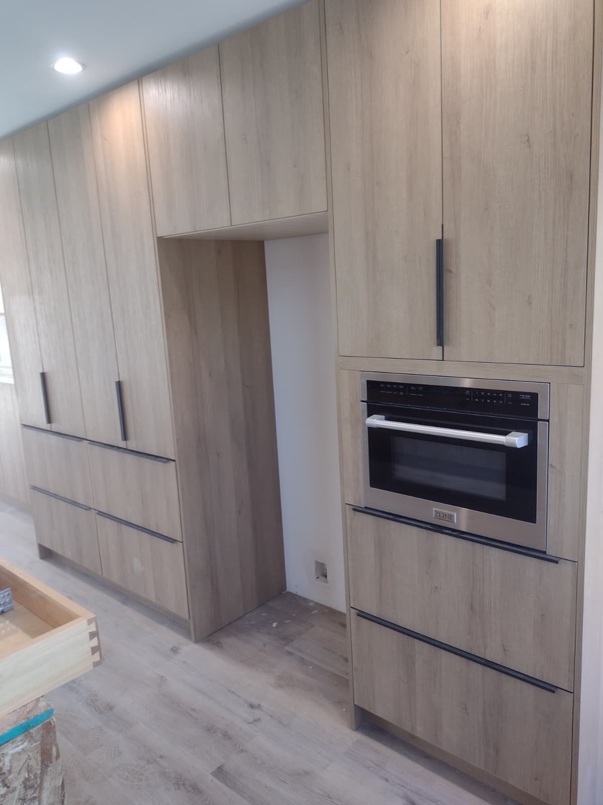 Modern European Kitchen with Custom Wood-Look Fronts